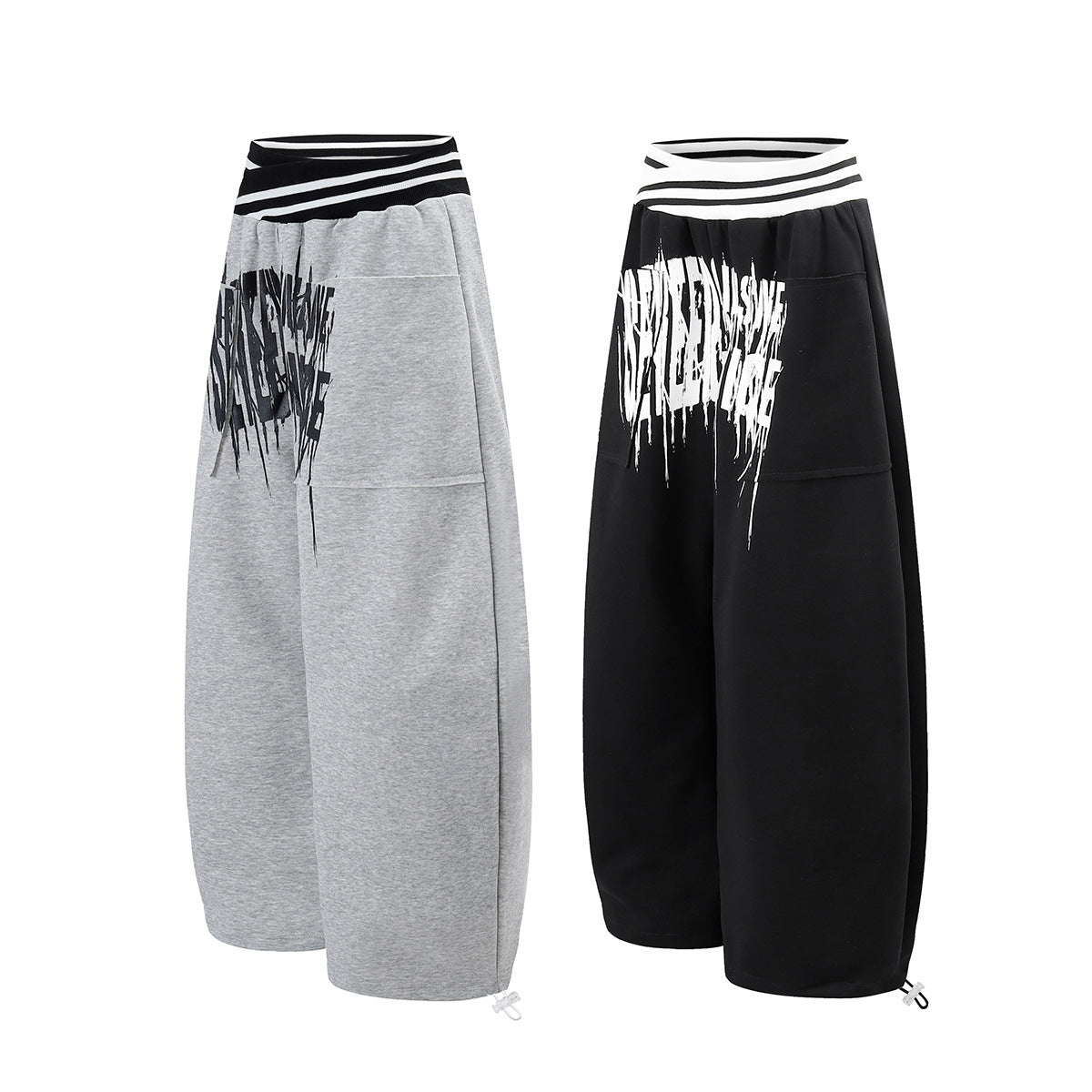 Jogginghose mit weitem Bein zum Hineinschlüpfen, gestreiftem Bund und Gothic-Grafikprint