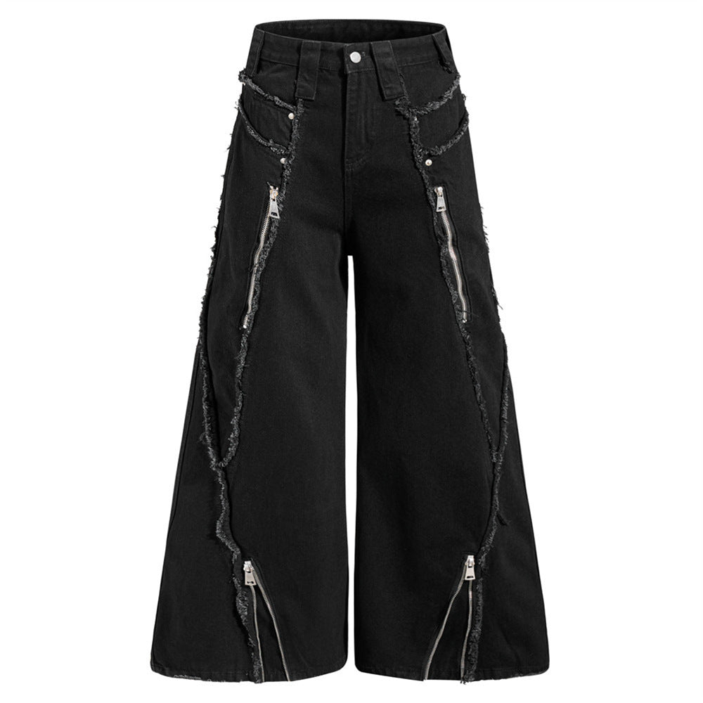 Black wide-leg deconstructed jeans with exposed silver zippers and raw frayed seam patchwork, front and back view