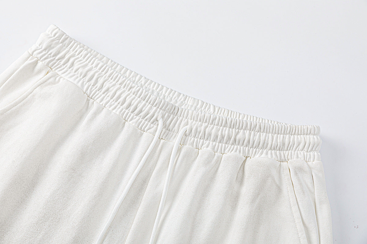 Pantalon de survêtement à jambes larges avec motif de notes de musique, coupe décontractée délavée