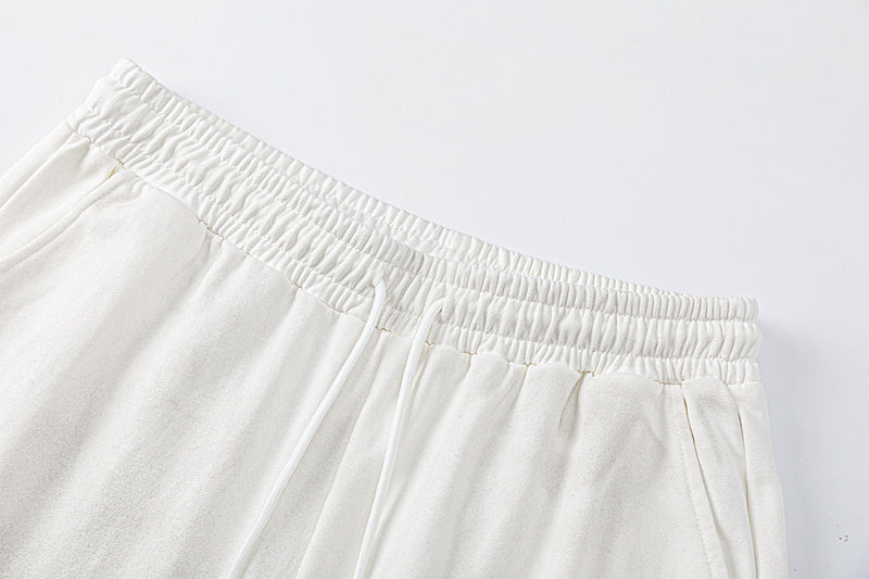 Pantalon de survêtement à jambes larges avec motif de notes de musique, coupe décontractée délavée