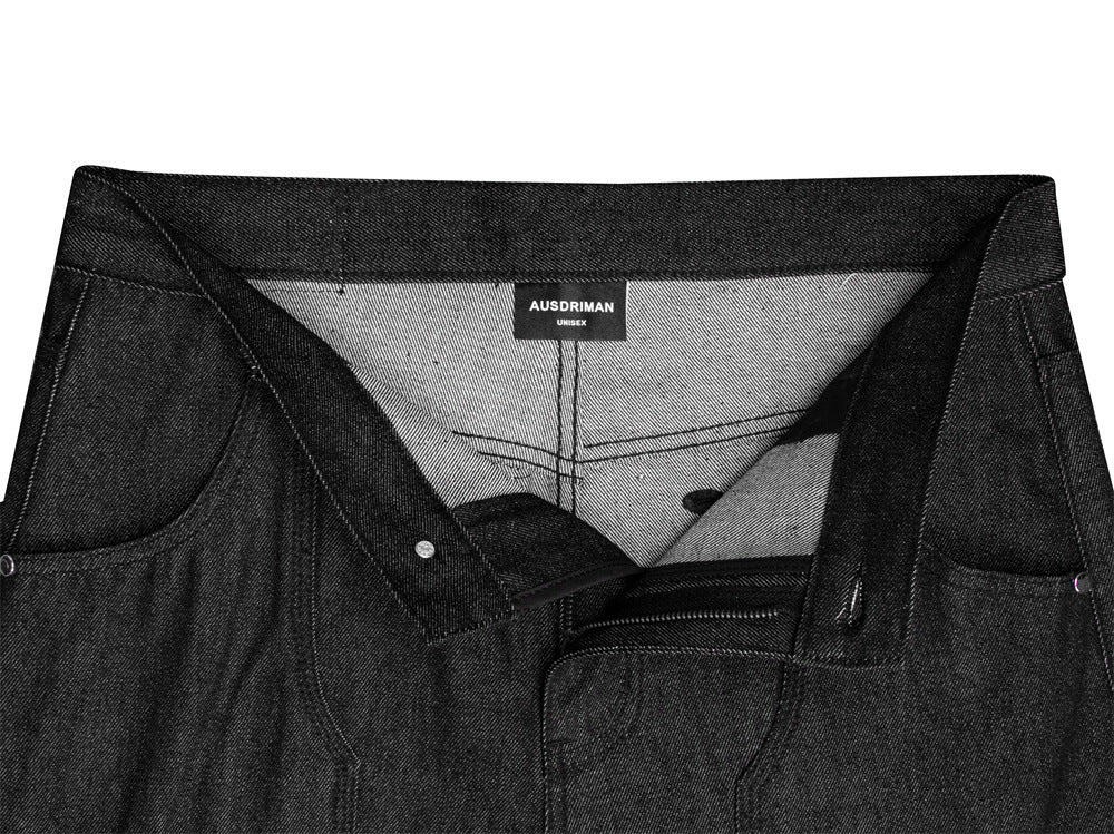 Jean homme à jambes larges avec broderie de badge et empiècements patchwork déconstruits