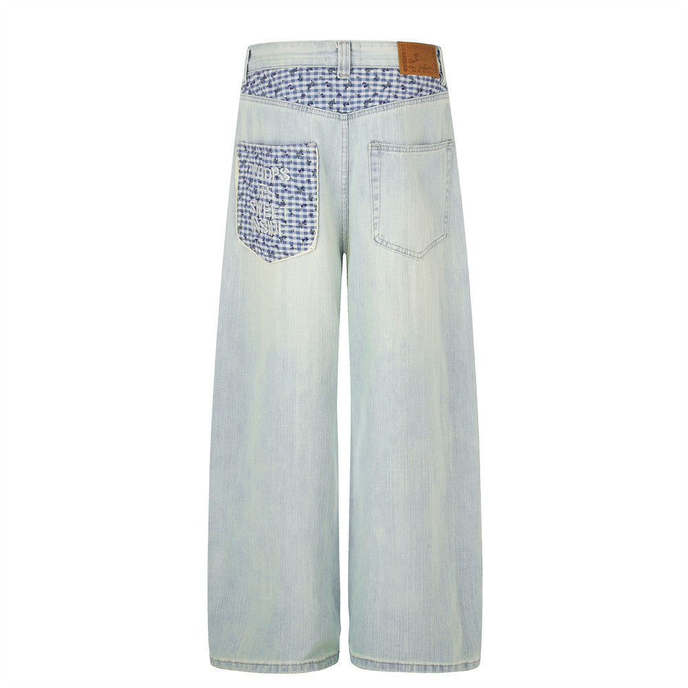 Jean homme à jambes larges, délavage clair, denim vintage déstructuré et empiècements vichy