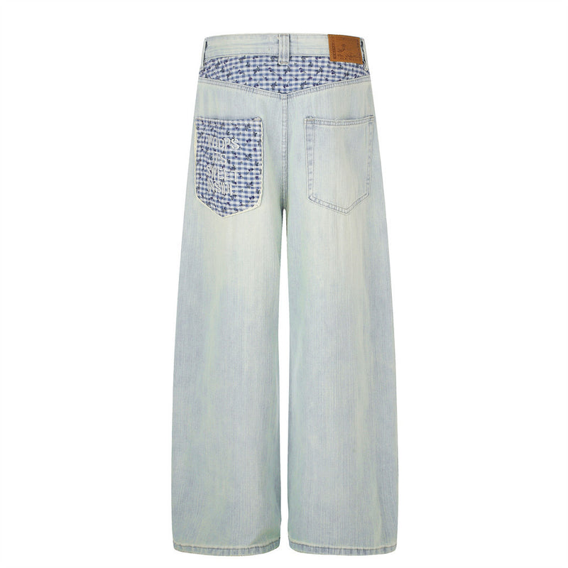 Jean homme à jambes larges, délavage clair, denim vintage déstructuré et empiècements vichy