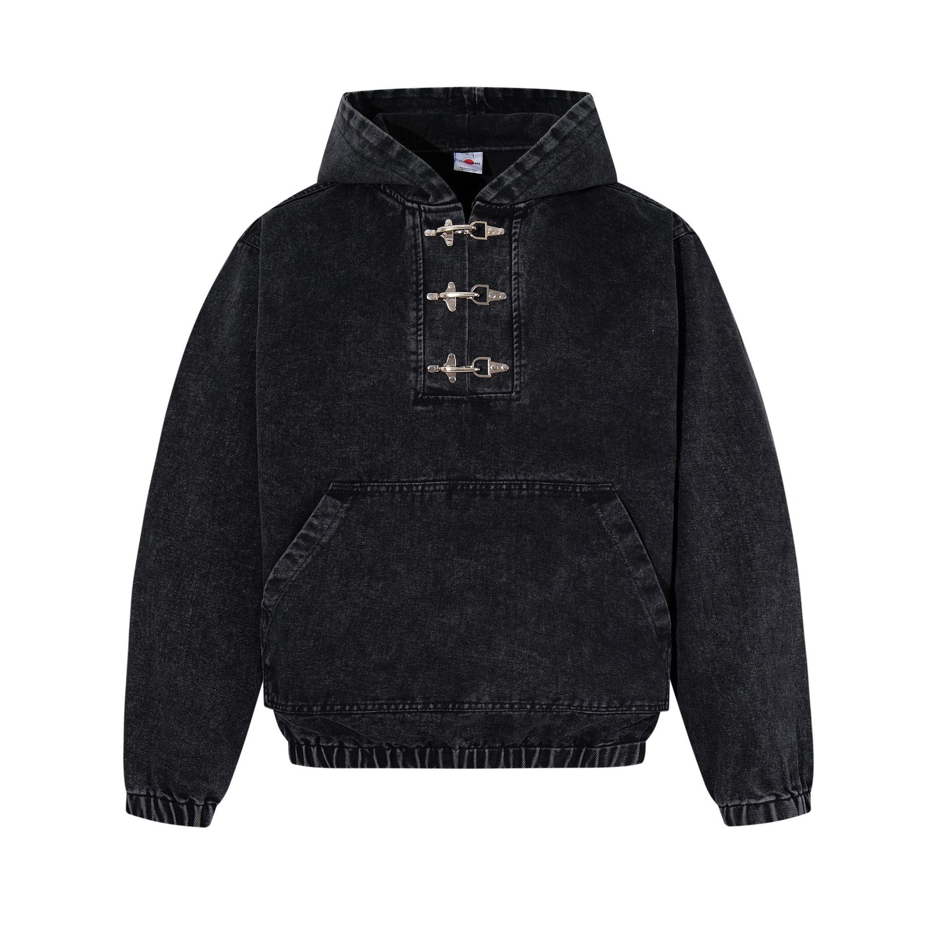Oversized washed black denim pullover hoodie with three silver metal clasp buckles on the front placket, kangaroo pocket, and