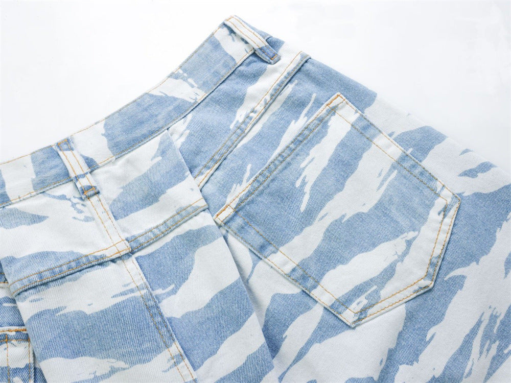 Close-up of back right pocket on light blue zebra camo denim pants