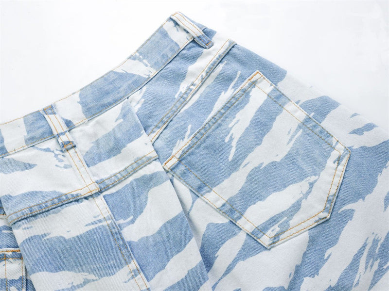 Close-up of back right pocket on light blue zebra camo denim pants