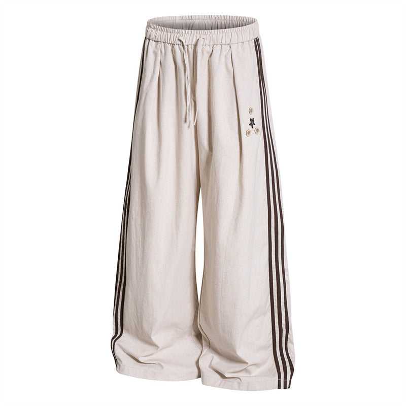 Pantalon de survêtement wide leg – Triple bande latérale, taille élastique à cordon