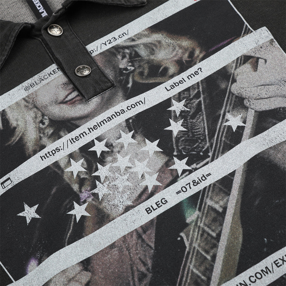 Close-up of graphic print with stars, text strips, and guitar illustration on black shirt