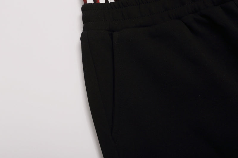Wide-Leg-Jogginghose mit Leo-Print-Bund & seitlichen Nieten