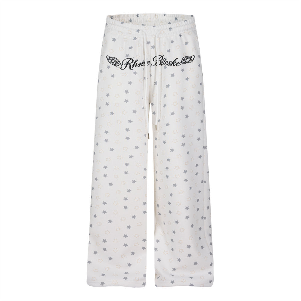 Pantalon de survêtement à jambes larges, imprimé étoiles, avec ailes d’ange et broderie de lettres