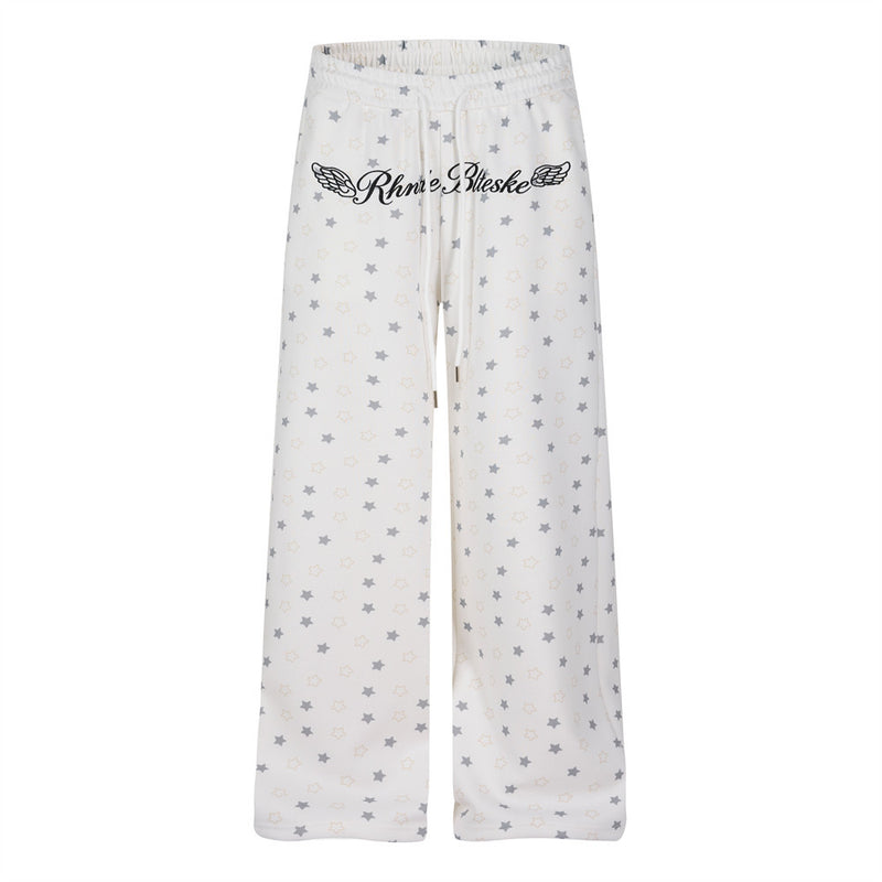 Pantalon de survêtement à jambes larges, imprimé étoiles, avec ailes d’ange et broderie de lettres