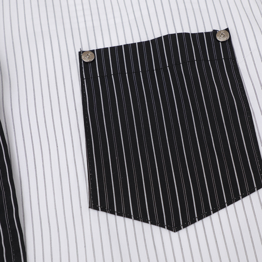 Black striped chest pocket with snap buttons on white shirt