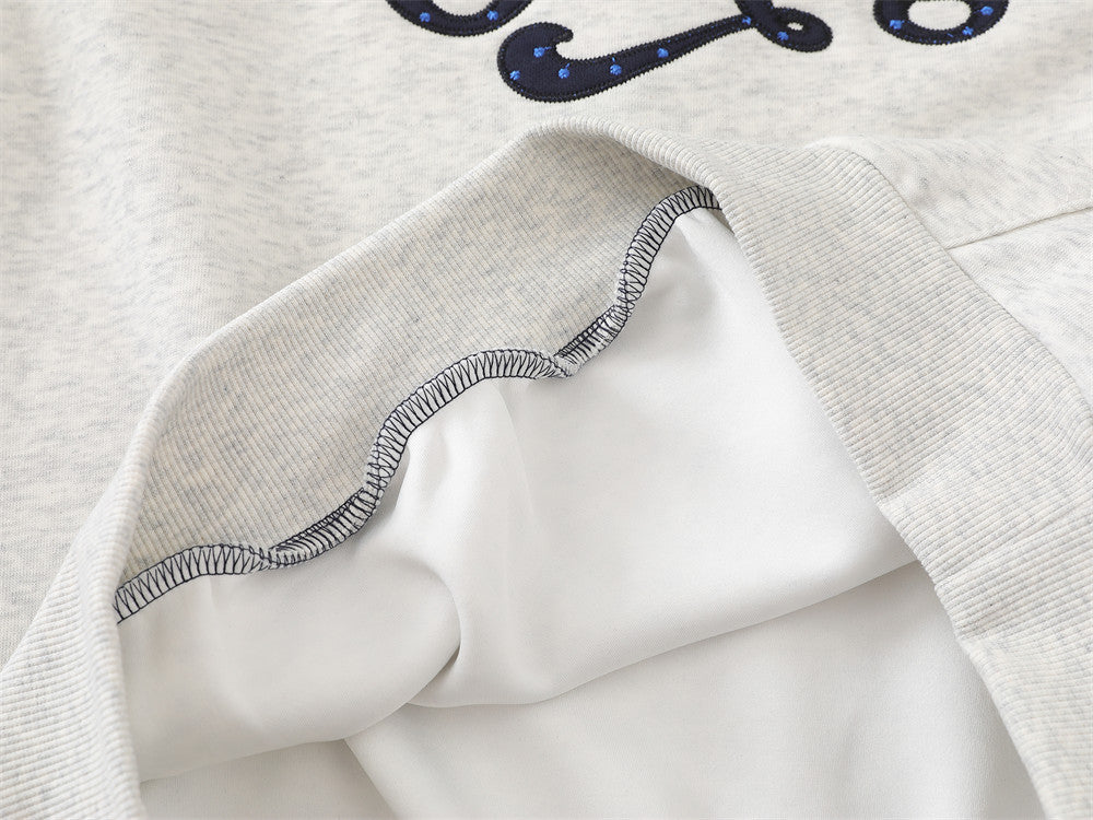 Sweat à capuche raglan colorblock à pois avec écusson brodé à lettrage