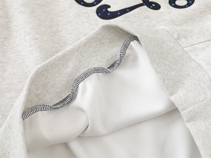 Sweat à capuche raglan colorblock à pois avec écusson brodé à lettrage