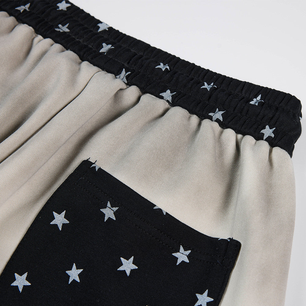 Pantalon de survêtement à jambes larges motif baroque – Imprimé usé, ceinture à étoiles