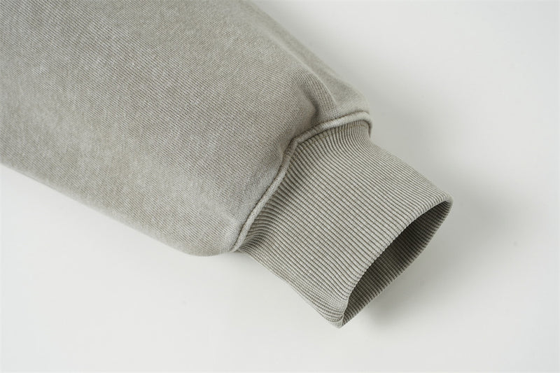 Sweat à capuche zippé homme délavé à l’acide, avec zip diagonal et empiècements déconstruits