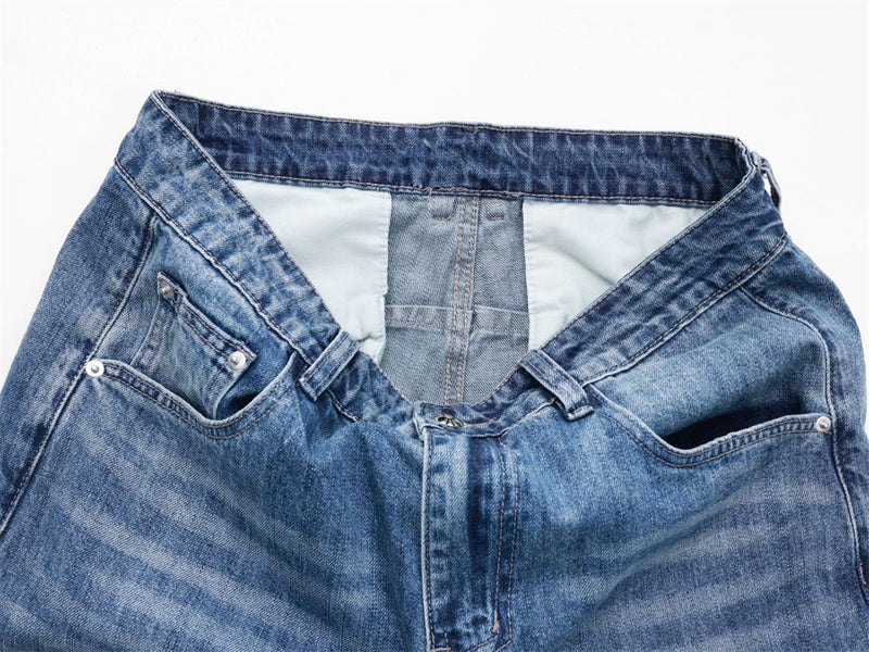 Wide-Leg Baggy Jeans – Washed Blue Curved Seam Design with Contrast Pocket