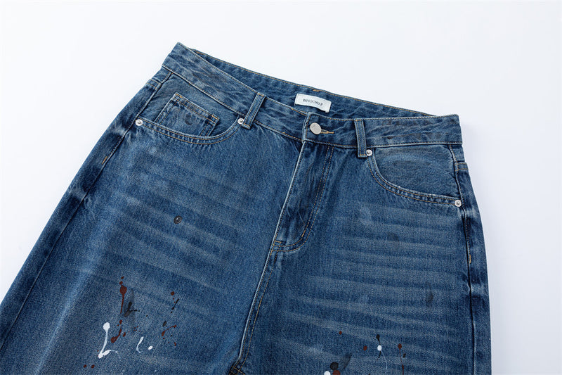 Wide-Leg Distressed Jeans with Paint Splatter & Ripped Knees – Vintage Punk