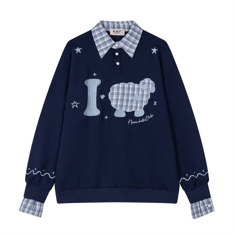 Oversized layered-look plaid collar sweatshirt with cartoon sheep appliqué in navy blue, front view