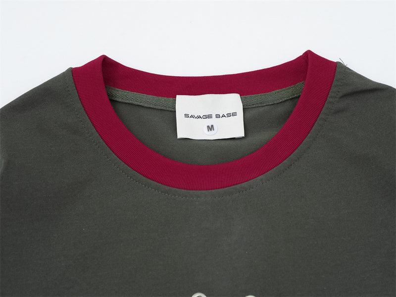 T-shirt manches longues colorblock à effet superposé – Imprimé vintage et détails métalliques