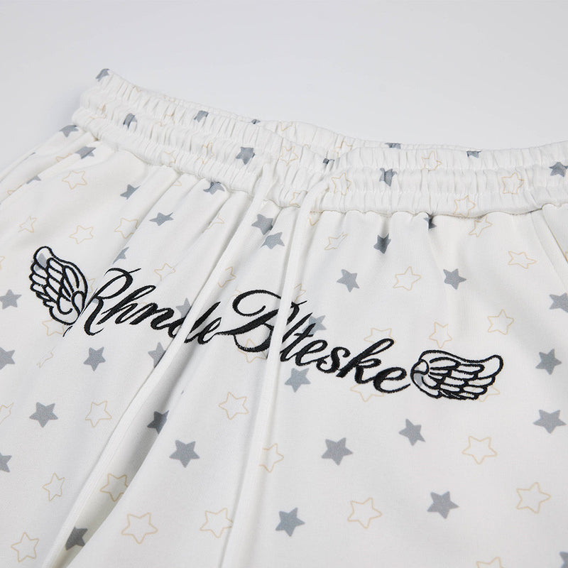Pantalon de survêtement à jambes larges, imprimé étoiles, avec ailes d’ange et broderie de lettres