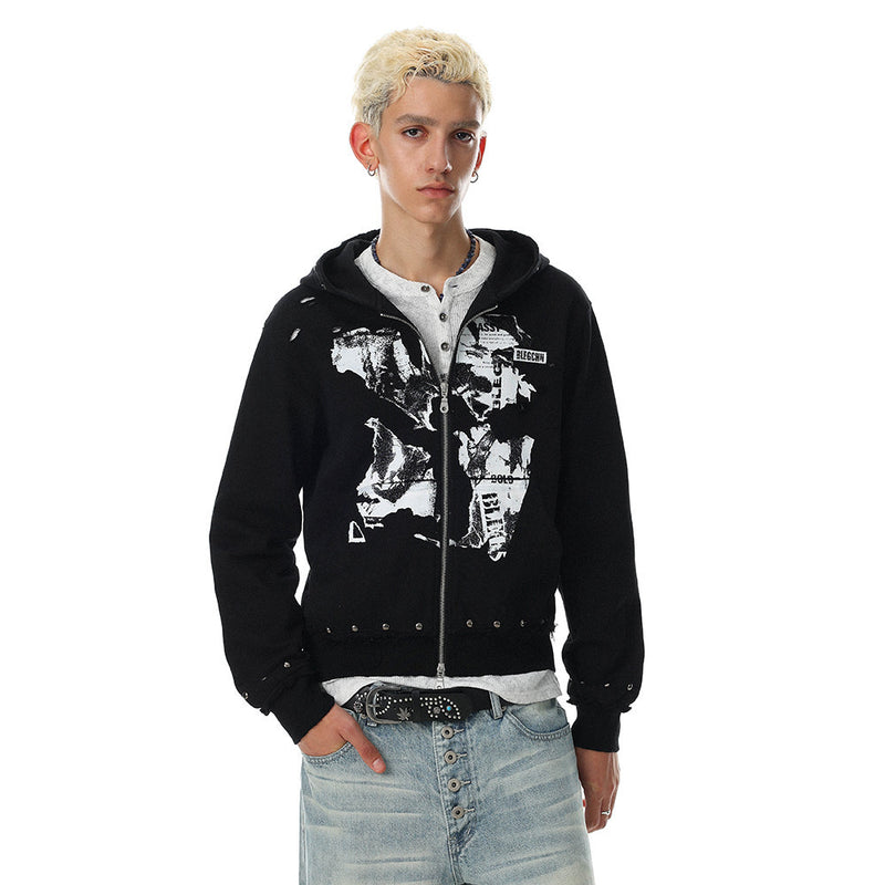 Black zip-up hoodie with abstract white graphic print, hood up and worn with light jeans