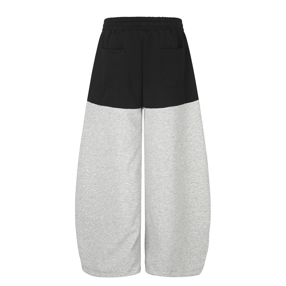 Pantalones de Chándal de Pierna Ancha con Bloques de Color y Detalles Gráficos de Tachuelas Plateadas