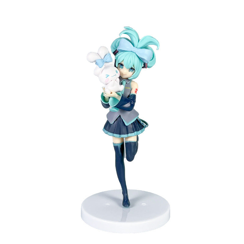 This charming 21cm PVC figure, &quot;Hatsune Miku Holding Cinnamoroll,&quot; features the iconic teal-haired Miku with a matching outfit, holding a white rabbit plush. She&