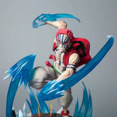 The Rengoku Kyojuro Demon Slayer Figure, a 26cm PVC collectible by Demon Slayer, features dynamic ice powers. It captures the Flame Hashira in action with red spiky hair and colorful face markings, wearing white pants and a red cloth, enhanced by light-up effects highlighting his muscular build.