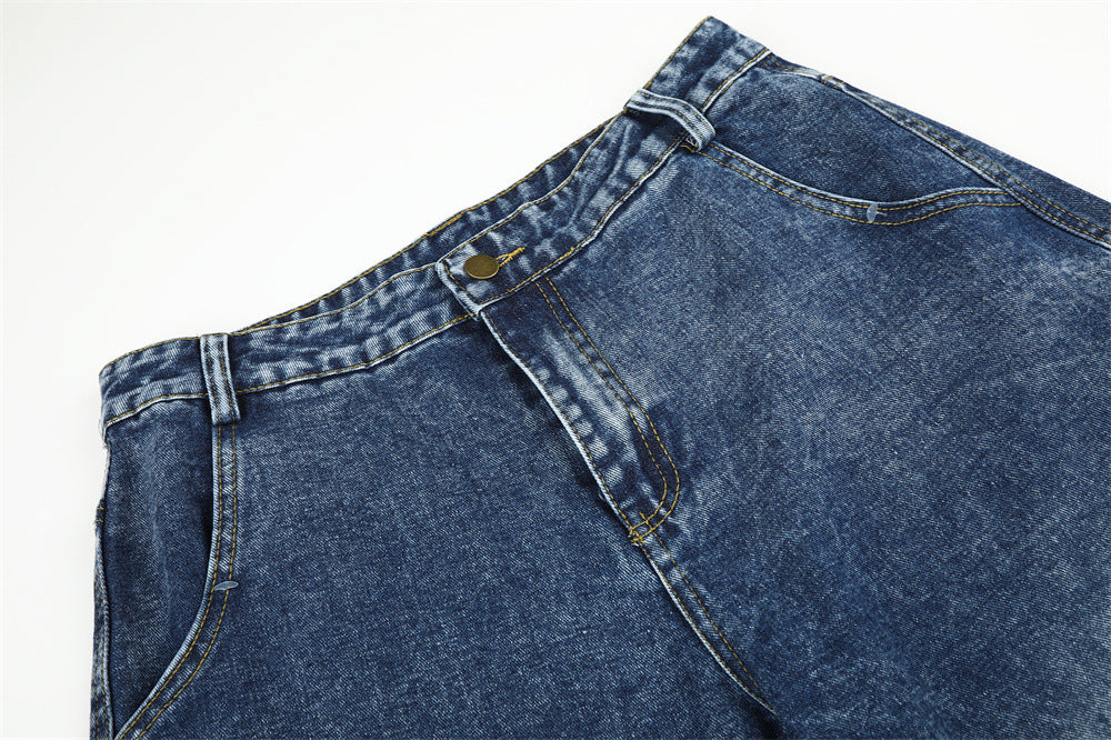 Jean homme wide leg délavé à l'acide avec broderie rouge en écriture manuscrite