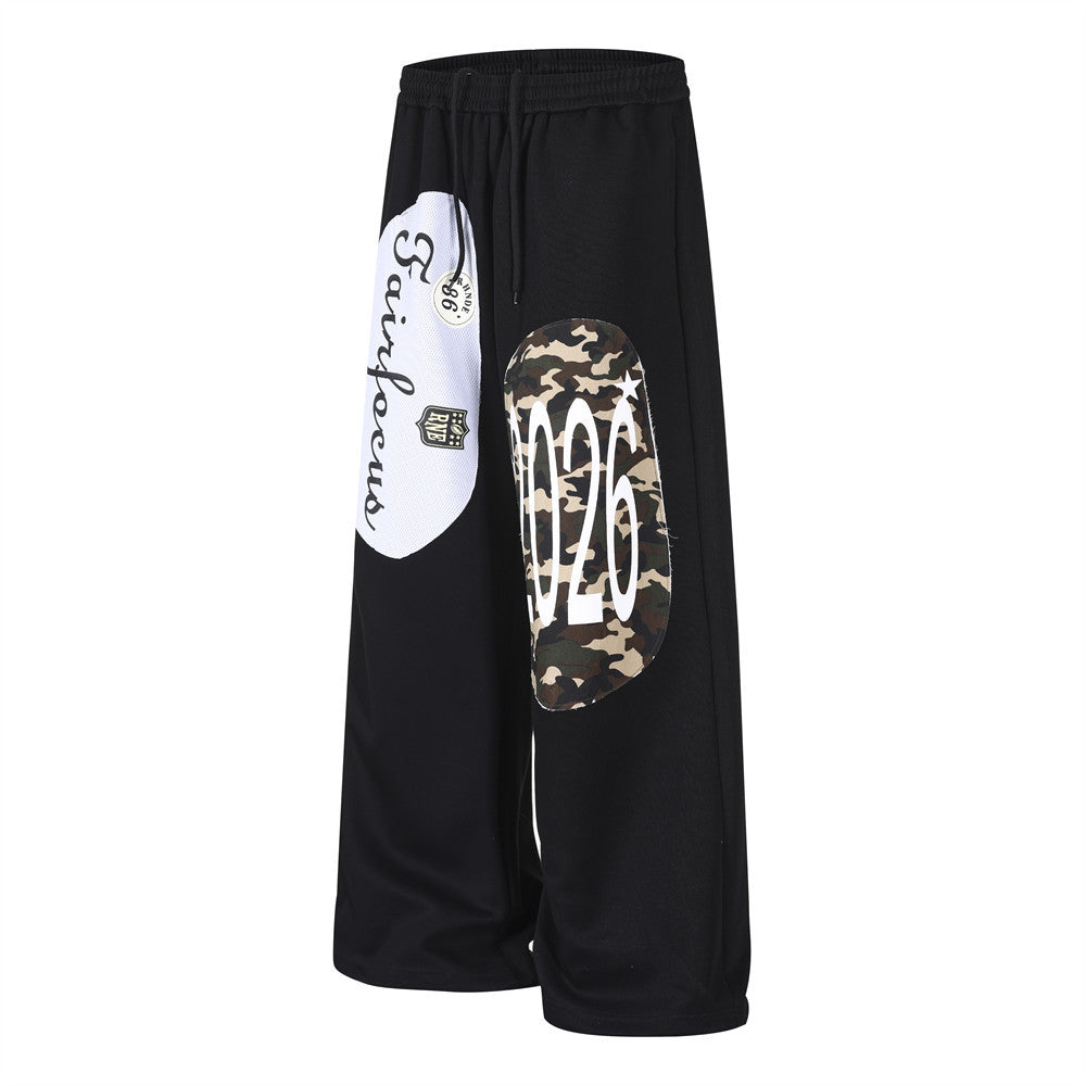 Wide-Leg Sweatpants with Camo & Script Patchwork Appliqués