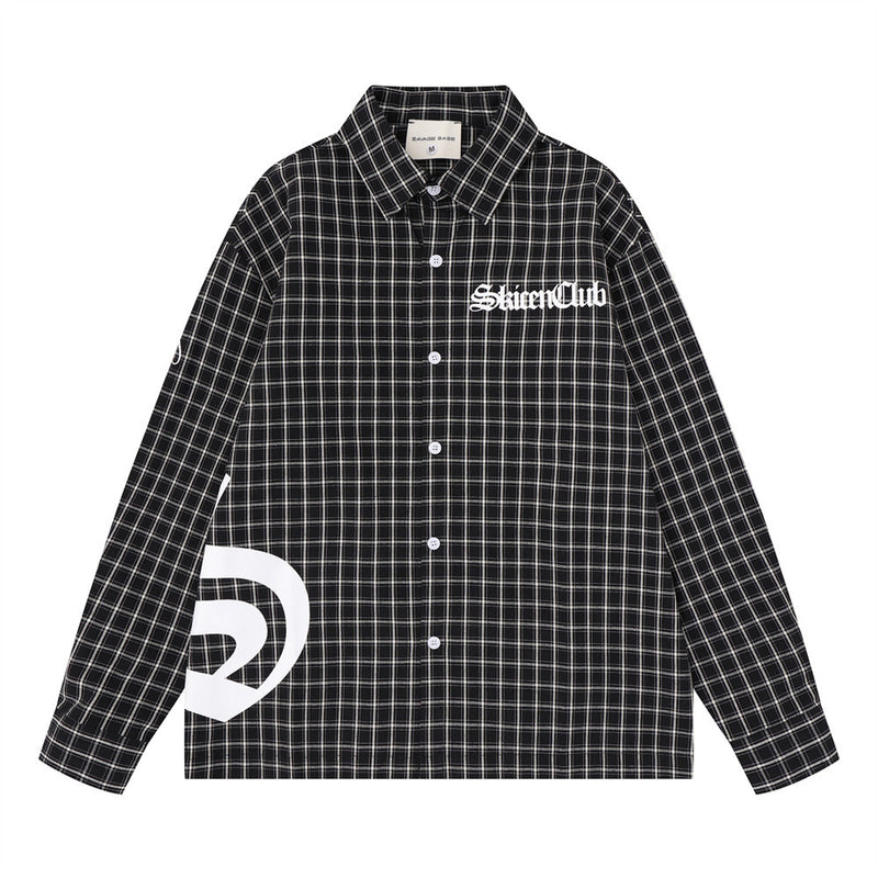 Black plaid long sleeve shirt front view with white Gothic logo print on chest and hem