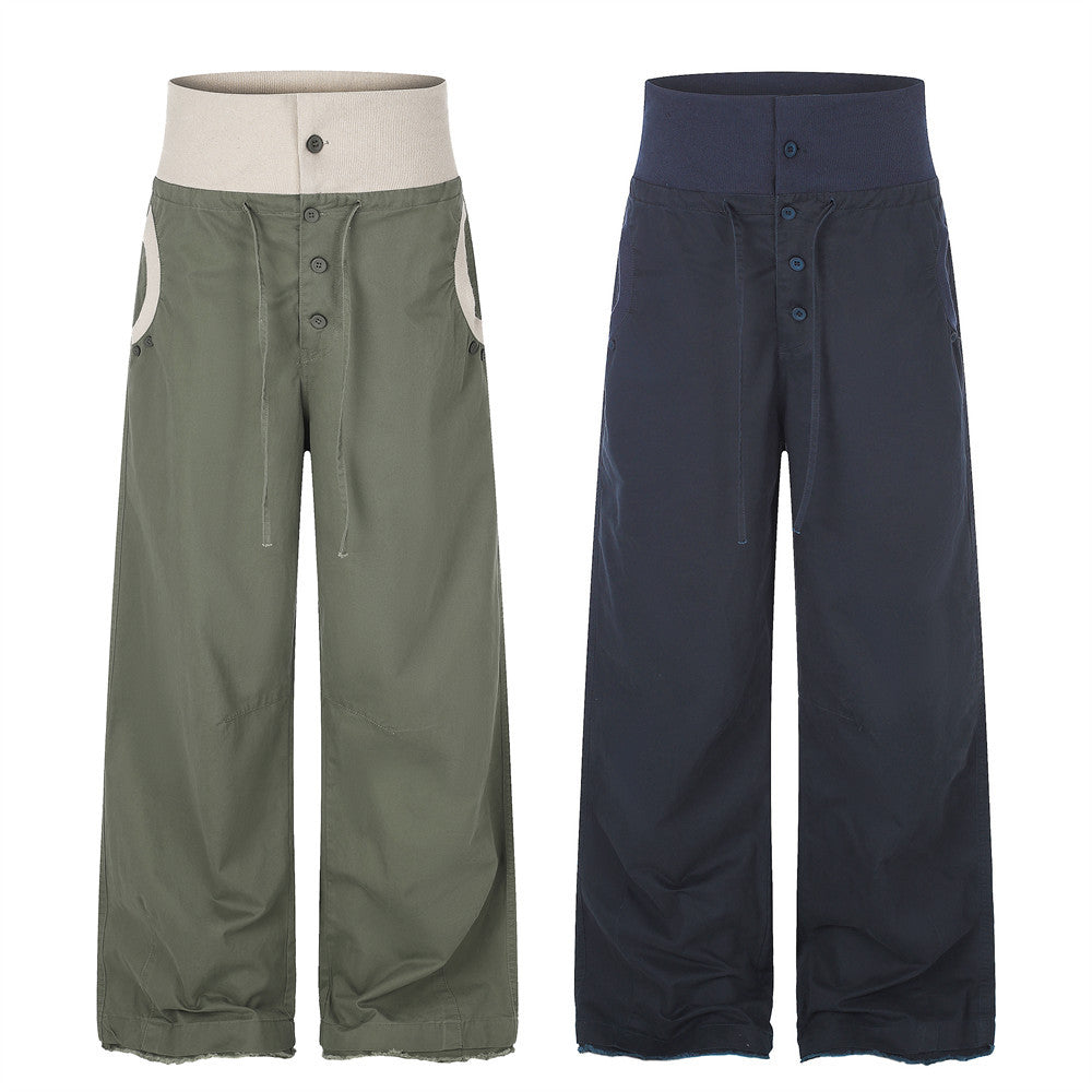 Pantalon palazzo à jambes larges, taille haute côtelée et braguette à boutons, disponible en kaki et bleu marine