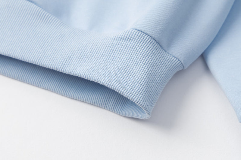 Sweat à capuche bleu zippé intégral avec patch brodé du numéro varsity 07