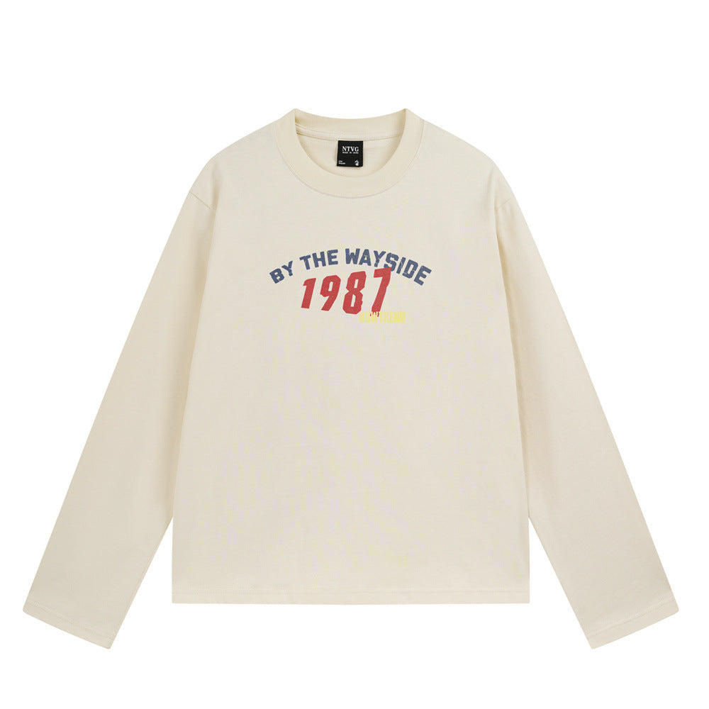 Long sleeve crew neck t-shirt with 1987 By The Wayside varsity graphic print in heather grey and cream