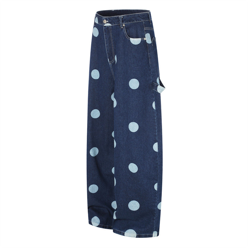 Side view of dark blue wide-leg jeans with light blue polka dots
