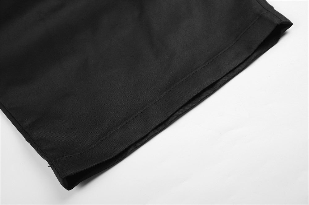Wide-Leg Pleated Trousers – Oversized Silhouette with Curved Hem