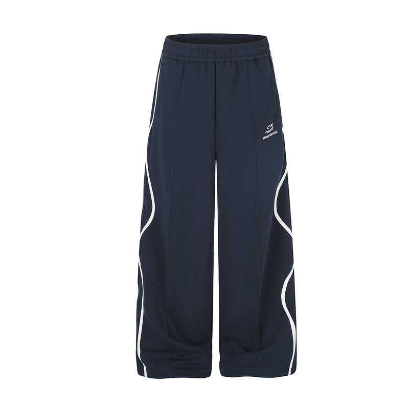 Pantalon de survêtement bleu marine à jambes larges avec passepoil à rayures ondulées blanches, vue de face et de dos, logo Smartbreak sur la cuisse gauche