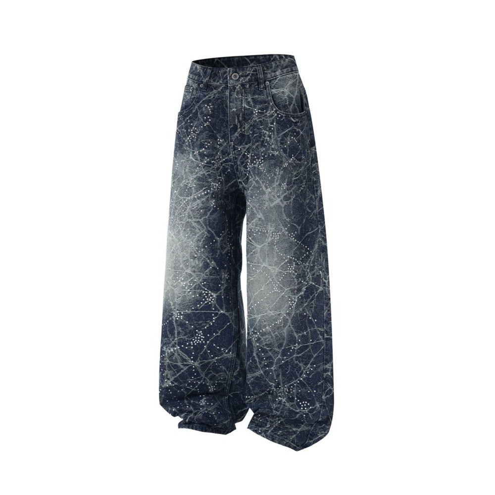 Three-quarter front view of wide-leg vintage washed jeans with scattered rhinestones