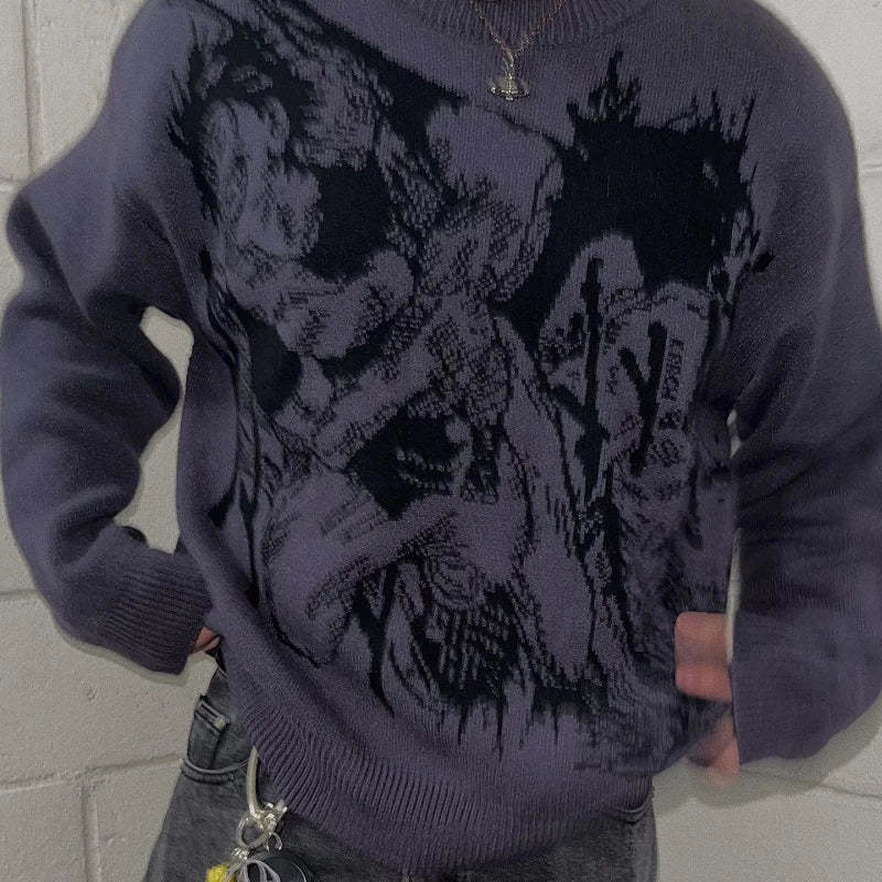 A person wearing a Jujutsu Kaisen Premium Geto Suguru-Inspired Knit Sweater with a Cursed Manipulation Jacquard Design stands against a light gray wall. Complemented by dark jeans, their keychain dangles from a pocket, adding casual flair.