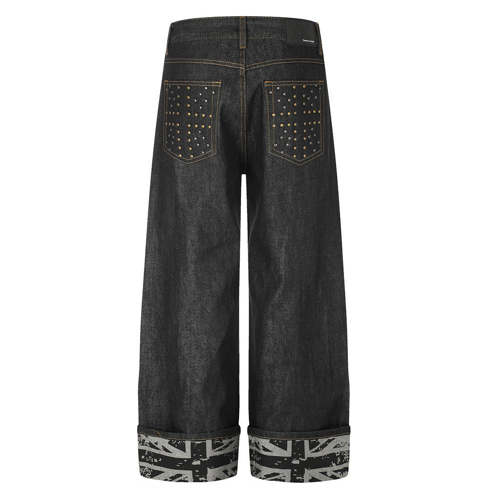 Jean homme à jambes larges – Denim noir, poches arrière cloutées et revers Union Jack