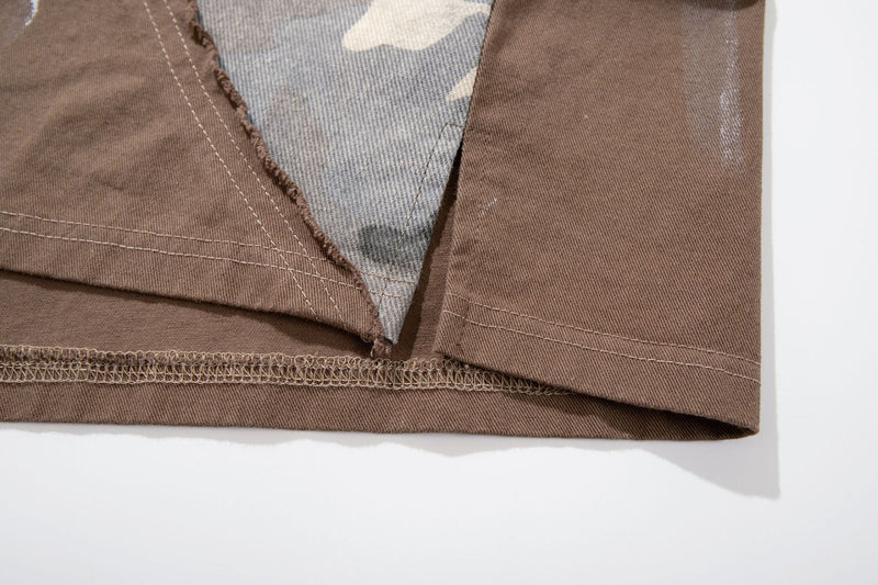 Chemise à manches courtes et col polo – Polo graffiti patchwork camouflage avec pinceau