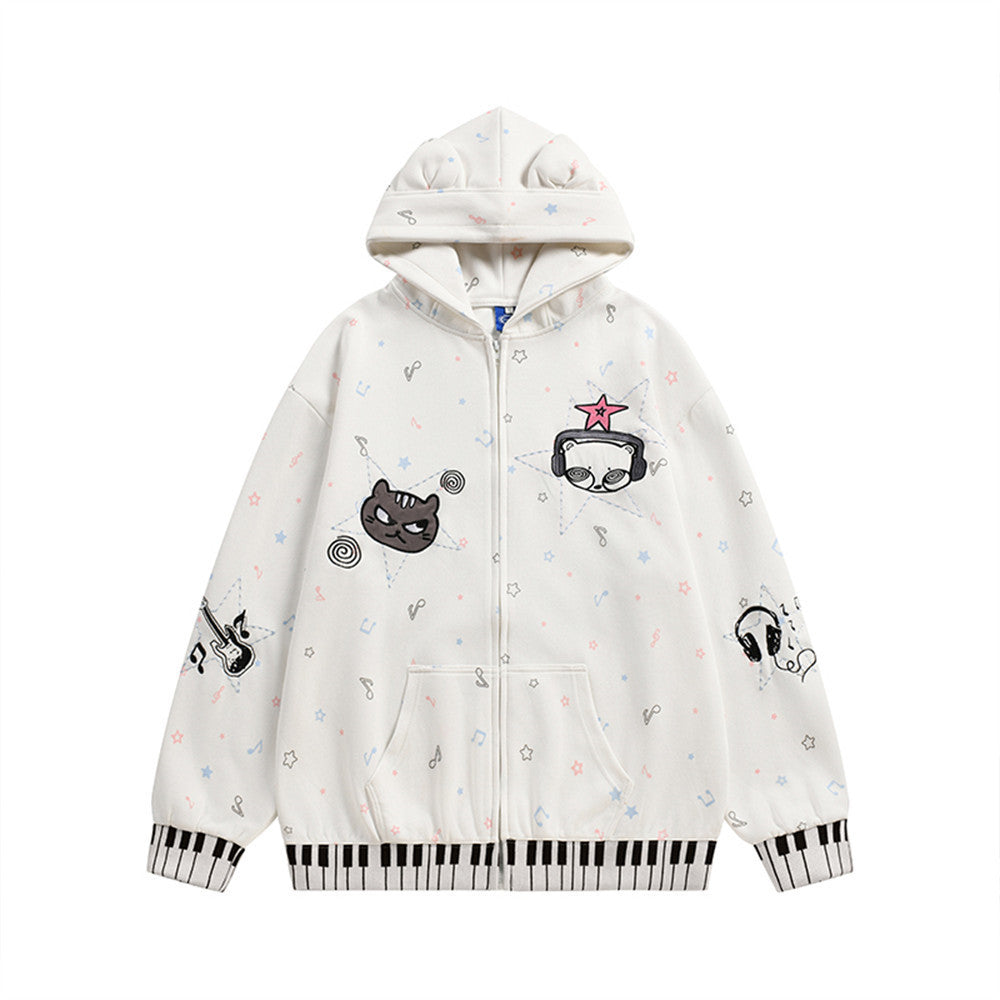 Oversized zip-up hoodie with cat ears, all-over music note print, cartoon cat and panda graphics, and piano key hem band in c