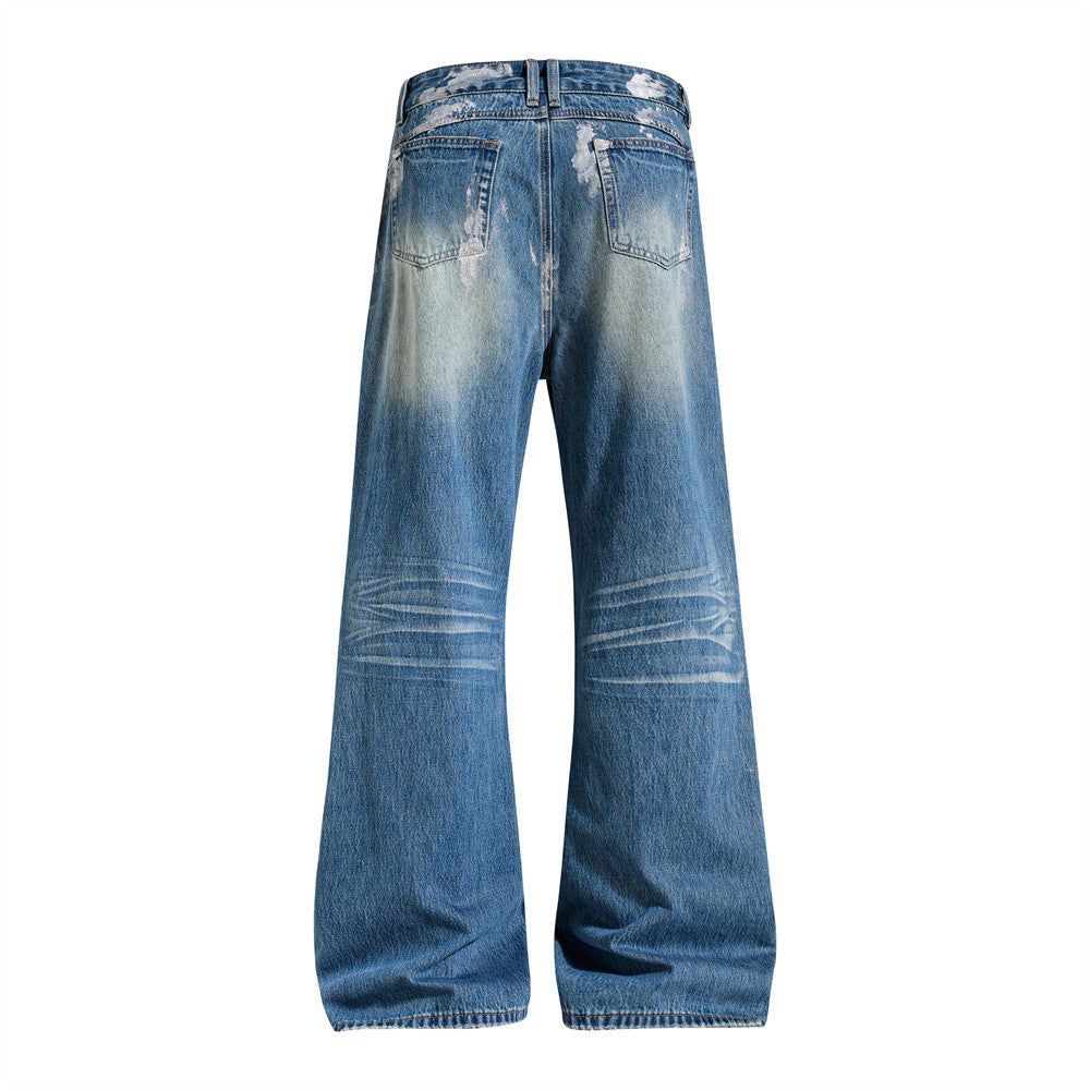 Distressed Flare Jeans – Men's Washed Blue Wide-Leg Denim with Paint Splatter
