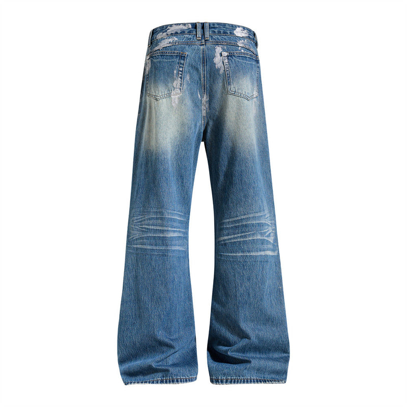 Distressed Flare Jeans – Men's Washed Blue Wide-Leg Denim with Paint Splatter