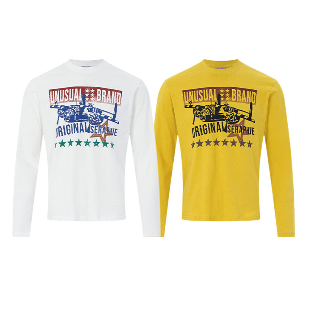 Men's long-sleeve crew-neck graphic t-shirt with fighter jet and star print in white and mustard yellow