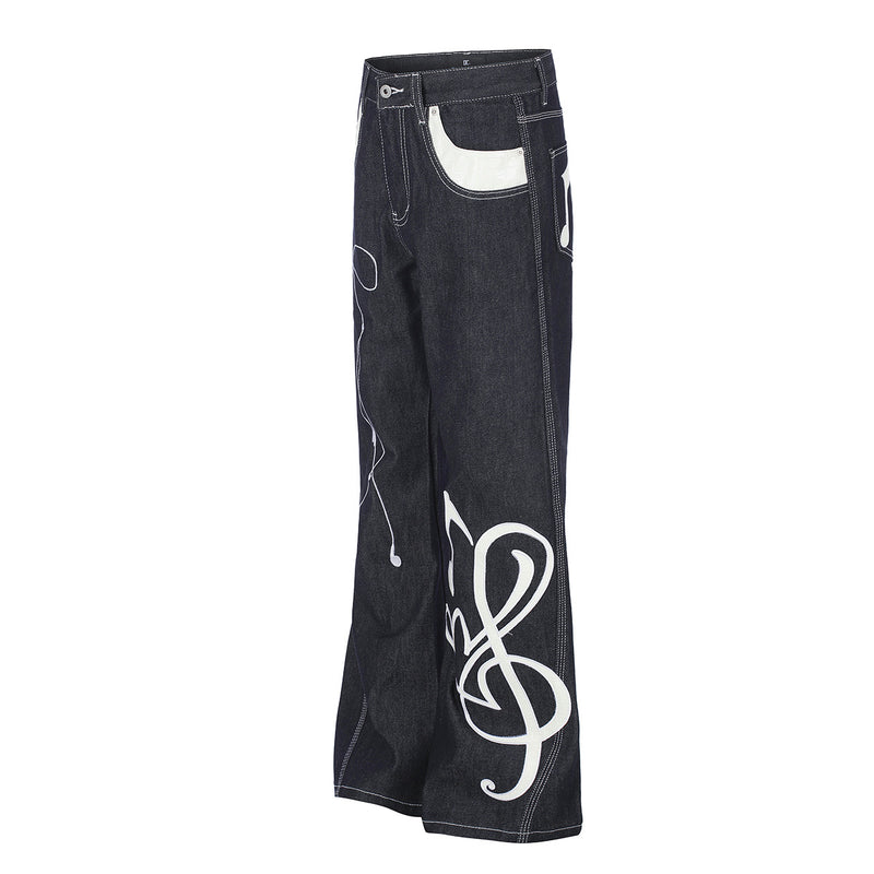 Jean baggy à jambes larges avec broderies et patch en cuir motif notes de musique — Denim noir brut