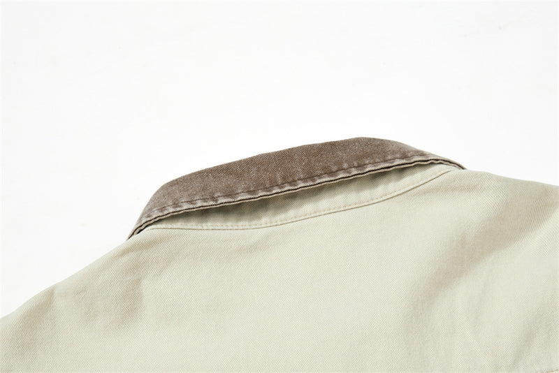 Brown textured collar on cream long sleeve button-up shirt