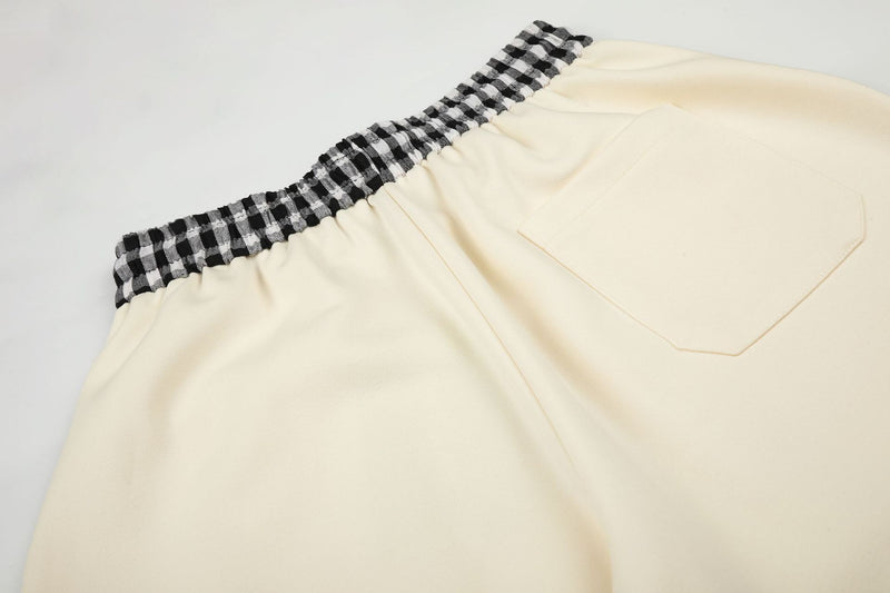 Pantalon de survêtement à jambes larges, imprimé main squelette et taille vichy