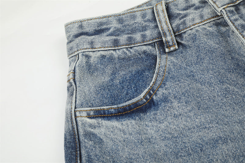 Jean large déchiré pour homme avec ornements en strass et étoiles